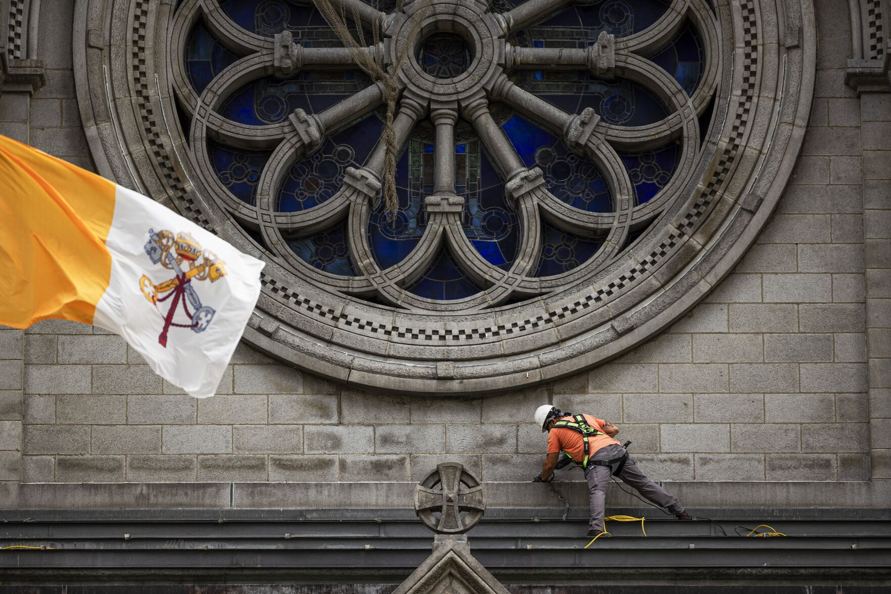 Workers repair the Cathedral Basilica of St. Louis
